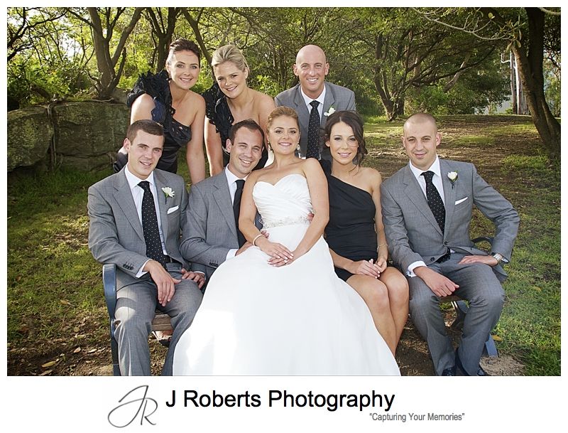 Bridal party gathered around the couple - wedding photography sydney